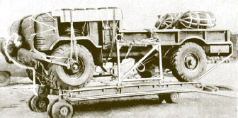 Парашютная платформа с погруженным на неё автомобилем ГАЗ-66Б